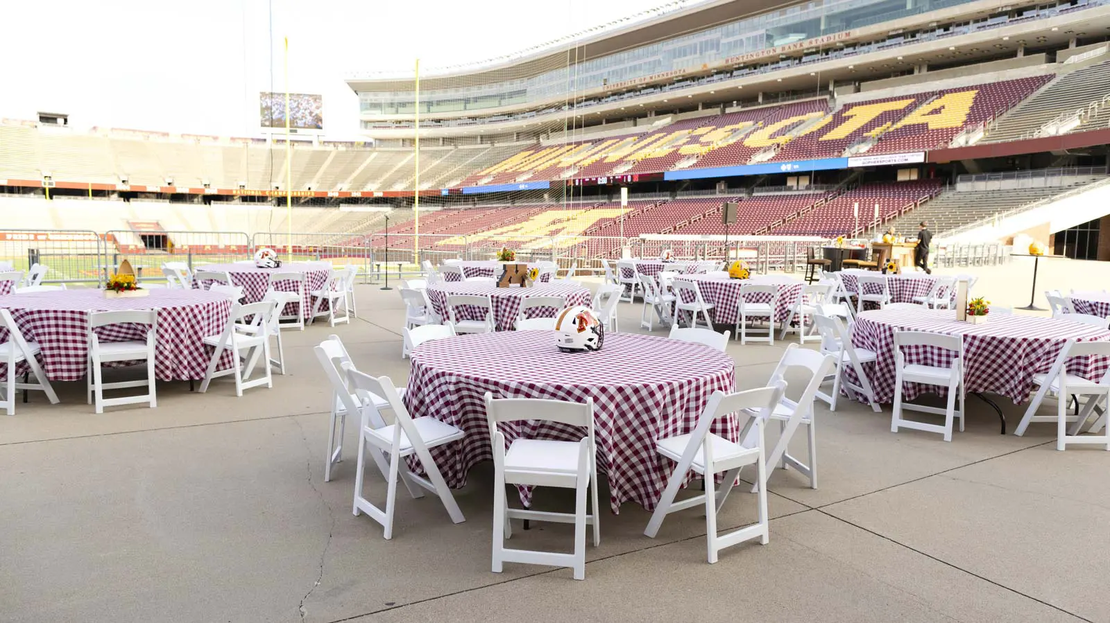 Conference tables in a room with Tvs