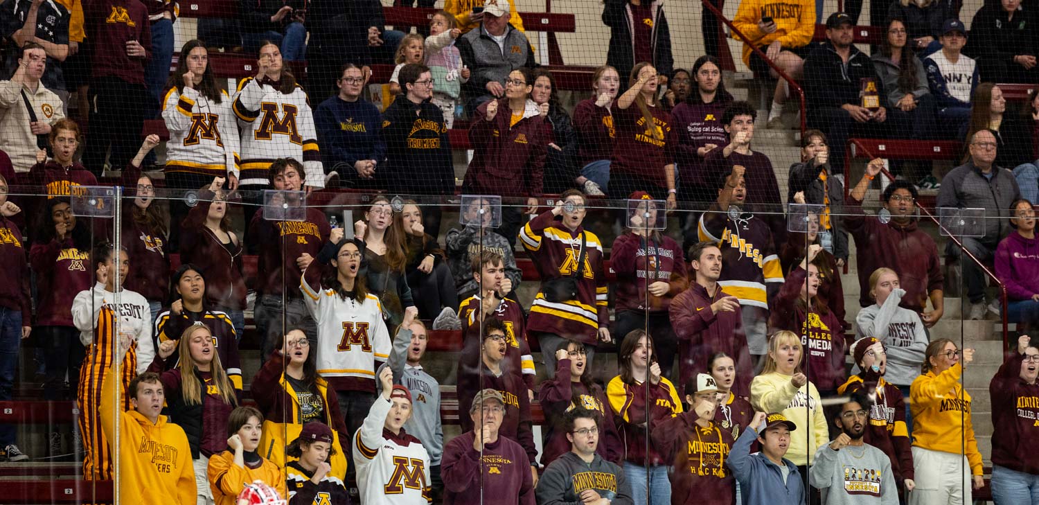golfer pushing her golf bag