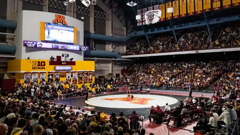 Fans watching Wrestling game from matside seats