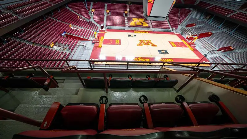 View of court from behind seats in loft