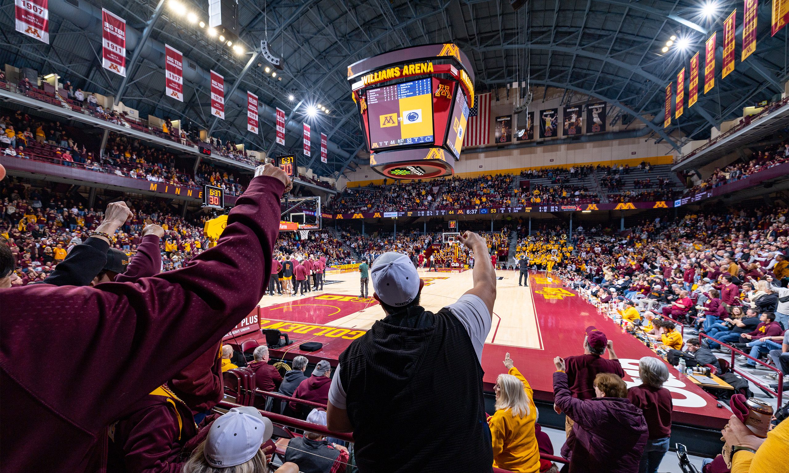 Players standing in warmups from behind