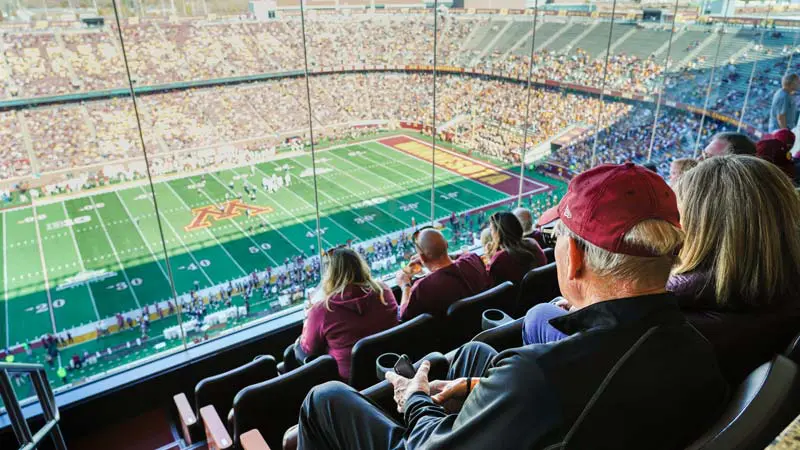 View of field from over a fans shoulder in a club seat
