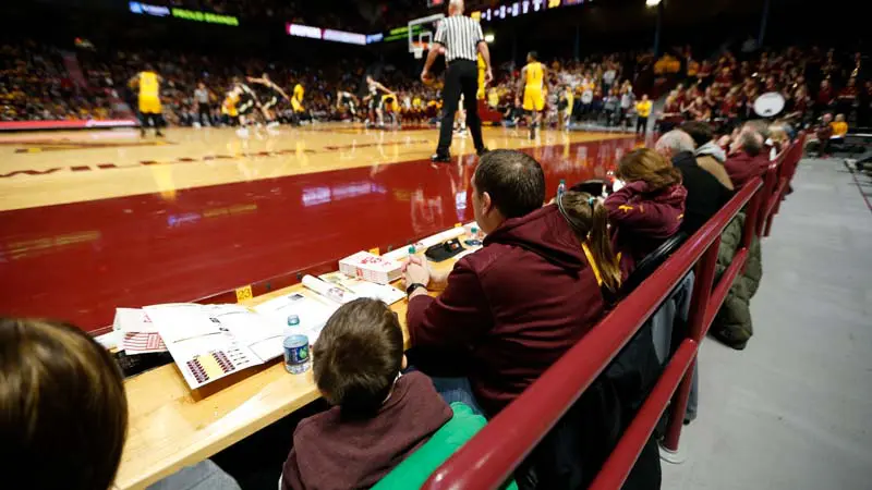 View of fans watching game from court level